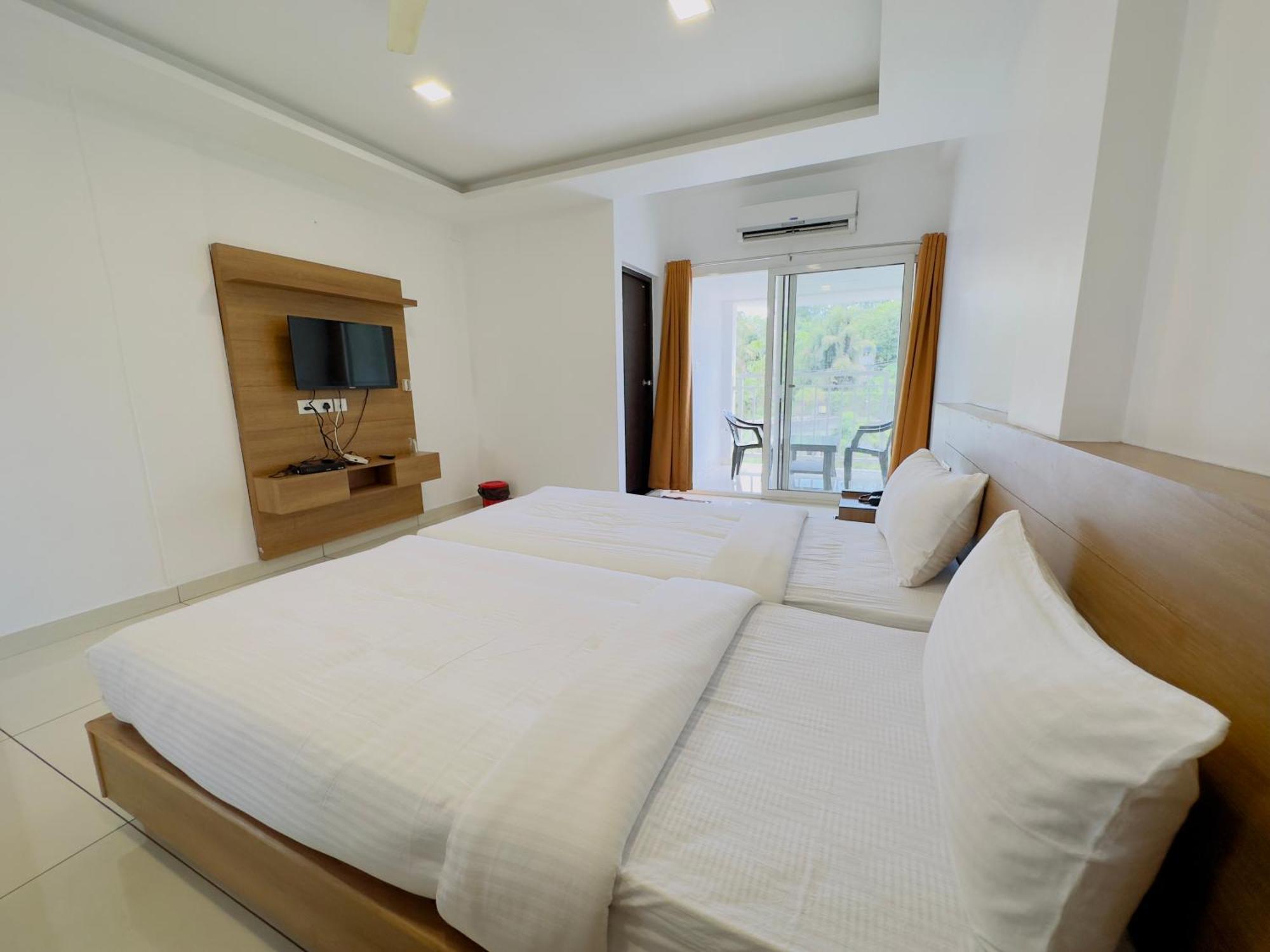Hotel Lets Stay Kochi Buitenkant foto